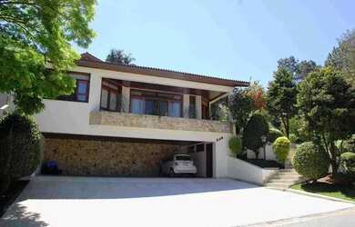 Imagem: A casa em condomínio possui 4 Dormitórios, 5 Banheiros, 4