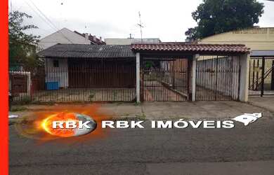 Imagem: A casa possui 2 Dormitórios, 1 Banheiro e 5 Vagas na garagem