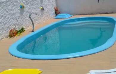 Imagem: A casa possui 2 Dormitórios, Acomodam 10 pessoas, 1 Vaga na