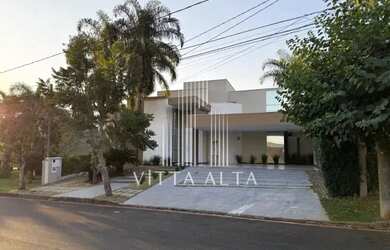 Imagem: A casa possui 4 Dormitórios, 5 Banheiros, 5 Vagas na garagem