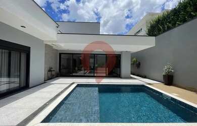 Imagem: A casa em condomínio possui 4 Dormitórios, 5 Banheiros, 5