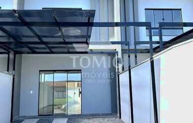 Imagem: A casa possui 2 Dormitórios, 3 Banheiros, 2 Vagas na garagem