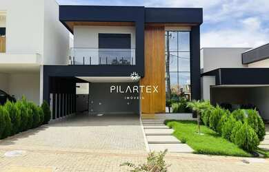 Imagem: A casa possui 3 Dormitórios, 4 Banheiros, 4 Vagas na garagem