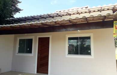 Imagem: A casa possui 2 Dormitórios, 2 Banheiros, 3 Vagas na garagem