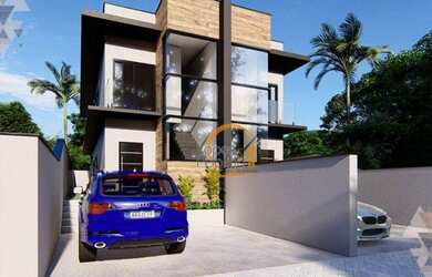 Imagem: A casa possui 3 Dormitórios, 1 Banheiro, 2 Vagas na garagem