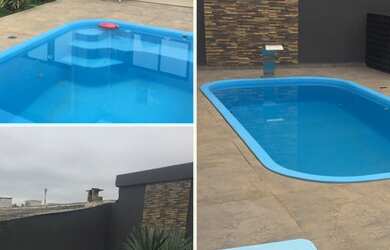 Imagem: A casa possui 3 Dormitórios, 3 Banheiros, 2 Vagas na garagem