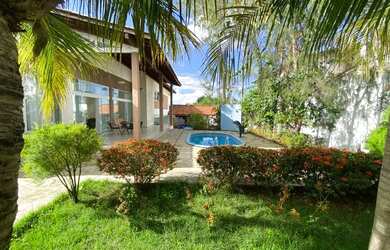 Imagem: A casa possui 5 Dormitórios, 2 Banheiros, 4 Vagas na garagem