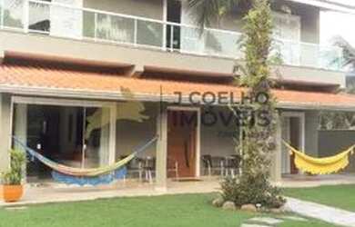 Imagem: A casa possui 4 Dormitórios, 5 Banheiros, 4 Vagas na garagem