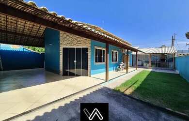 Imagem: A casa possui 2 Dormitórios, 2 Banheiros, 3 Vagas na garagem