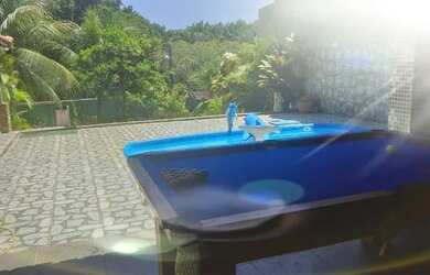 Imagem: A casa possui 4 Dormitórios, 3 Vagas na garagem e está localizado