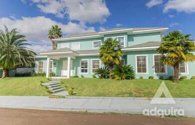 Imagem: A casa em condomínio possui 5 Dormitórios, 5 Banheiros, 3