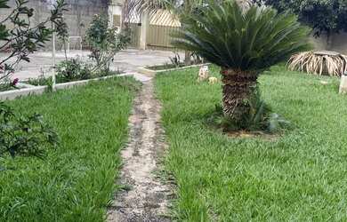 Imagem: A casa possui 4 Dormitórios, 3 Banheiros, 5 Vagas na garagem