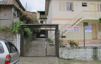 Imagem: A casa possui 2 Dormitórios, 1 Banheiro, 1 Vaga na garagem