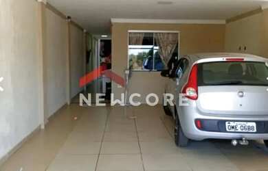 Imagem: A casa possui 4 Dormitórios, 2 Banheiros, 3 Vagas na garagem