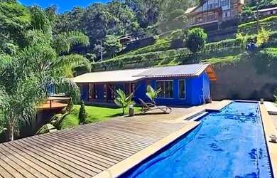 Imagem: A casa à venda possui 4 Dormitórios, 4 Banheiros, 2 Vagas