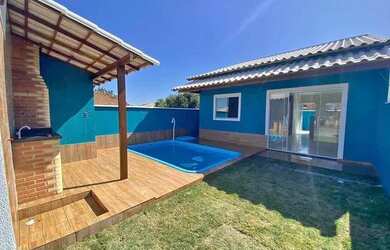 Imagem: A casa possui 3 Dormitórios, 1 Banheiro, 1 Vaga na garagem