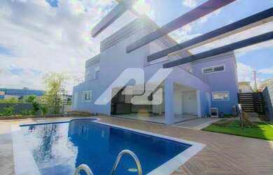 Imagem: A casa em condomínio possui 5 Dormitórios, 5 Banheiros, 5