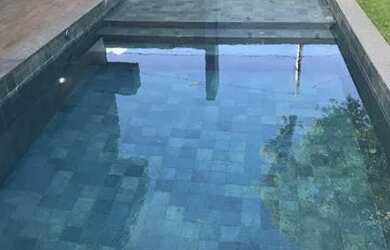 Imagem: A casa em condomínio possui 4 Dormitórios, 5 Banheiros, 2