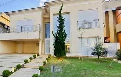 Imagem: A casa em condomínio possui 4 Dormitórios, 5 Banheiros, 4