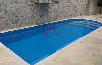 Imagem: A casa possui 4 Dormitórios, 4 Banheiros, 2 Vagas na garagem