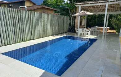 Imagem: A casa possui 4 Dormitórios, 5 Vagas na garagem e está localizado