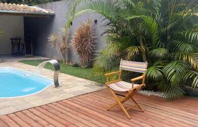 Imagem: A casa possui 2 Dormitórios, Acomodam 10 pessoas, 1 Vaga na