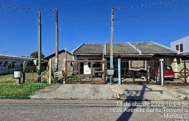 Imagem: A casa possui 2 Dormitórios, 1 Banheiro, 1 Vaga na garagem