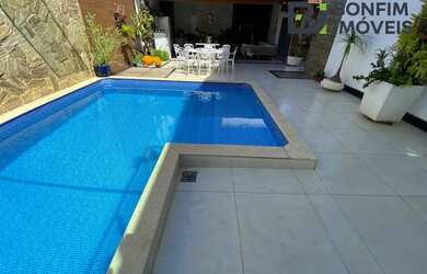 Imagem: A casa possui 4 Dormitórios, 5 Banheiros, 5 Vagas na garagem