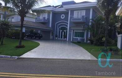 Imagem: A casa possui 4 Dormitórios, 5 Banheiros, 3 Vagas na garagem