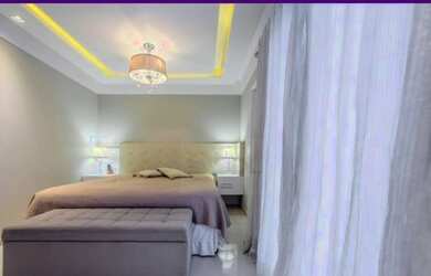 Imagem: A casa possui 3 Dormitórios, 3 Banheiros, 3 Vagas na garagem