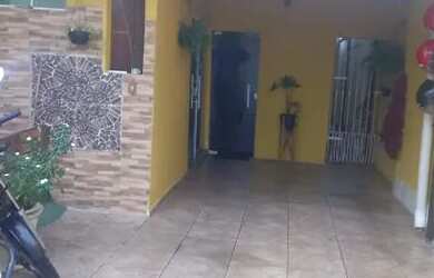 Imagem: A casa possui 2 Dormitórios, 2 Banheiros, 3 Vagas na garagem