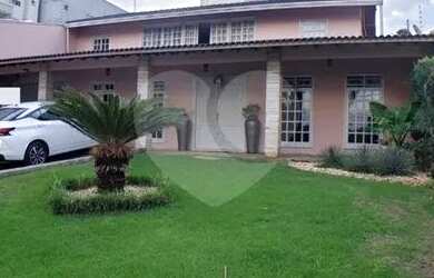 Imagem: A casa possui 5 Dormitórios, 4 Banheiros, 5 Vagas na garagem