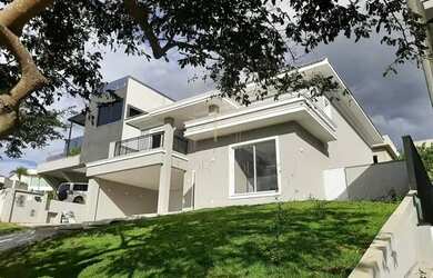 Imagem: A casa possui 4 Dormitórios, 5 Banheiros, 5 Vagas na garagem