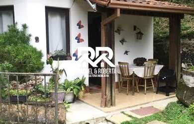 Imagem: A casa possui 5 Dormitórios, 5 Banheiros, 5 Vagas na garagem