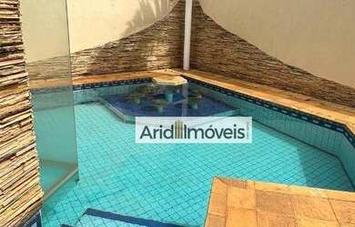 Imagem: A casa em condomínio possui 4 Dormitórios, 5 Banheiros, 4