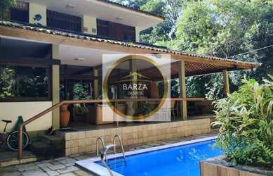 Imagem: A casa em condomínio possui 5 Dormitórios, 4 Banheiros, 4