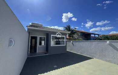 Imagem: A casa possui 2 Dormitórios, 3 Banheiros, 3 Vagas na garagem