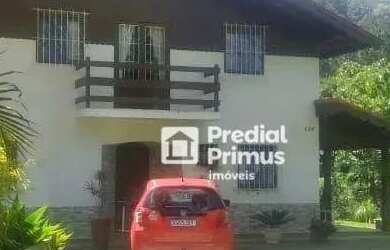 Imagem: A casa possui 4 Dormitórios, 4 Banheiros, 3 Vagas na garagem