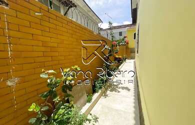 Imagem: A casa possui 5 Dormitórios, 2 Banheiros, 3 Vagas na garagem