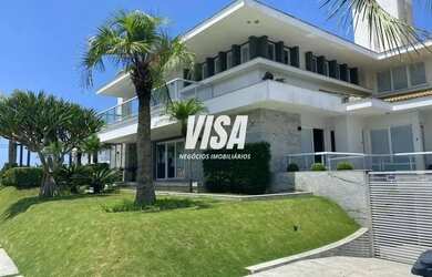 Imagem: A casa possui 5 Dormitórios, 5 Banheiros, 5 Vagas na garagem