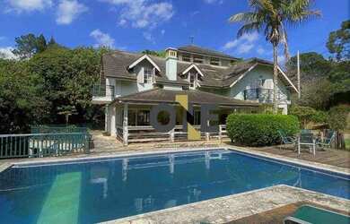 Imagem: A casa em condomínio possui 4 Dormitórios, 5 Banheiros, 5