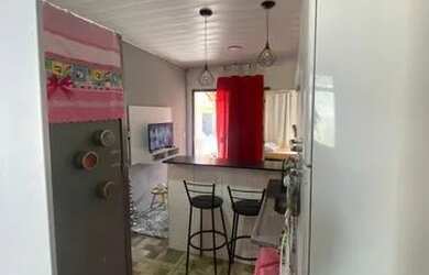 Imagem: A casa possui 2 Dormitórios, 1 Banheiro, 1 Vaga na garagem