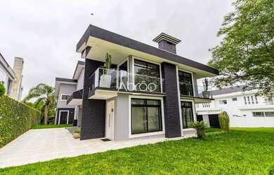 Imagem: A casa em condomínio possui 5 Dormitórios, 5 Banheiros, 3