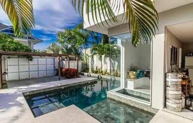 Imagem: A casa em condomínio possui 5 Dormitórios, 4 Banheiros, 2