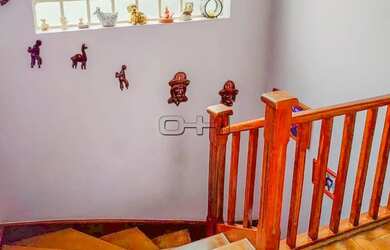 Imagem: A casa possui 3 Dormitórios, 4 Banheiros, 3 Vagas na garagem