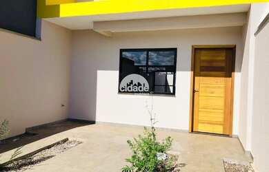 Imagem: A casa possui 2 Dormitórios, 1 Banheiro, 2 Vagas na garagem