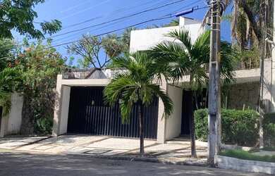 Imagem: A casa possui 4 Dormitórios, 4 Banheiros, 4 Vagas na garagem