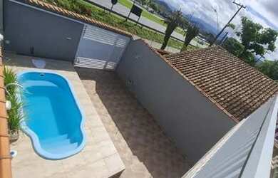 Imagem: A casa possui 2 Dormitórios, 3 Banheiros, 2 Vagas na garagem