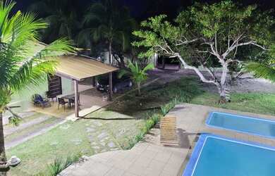 Imagem: A casa possui 5 Dormitórios, 5 Vagas na garagem e está localizado