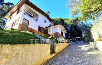 Imagem: A casa à venda possui 3 Dormitórios, 3 Banheiros, 3 Vagas